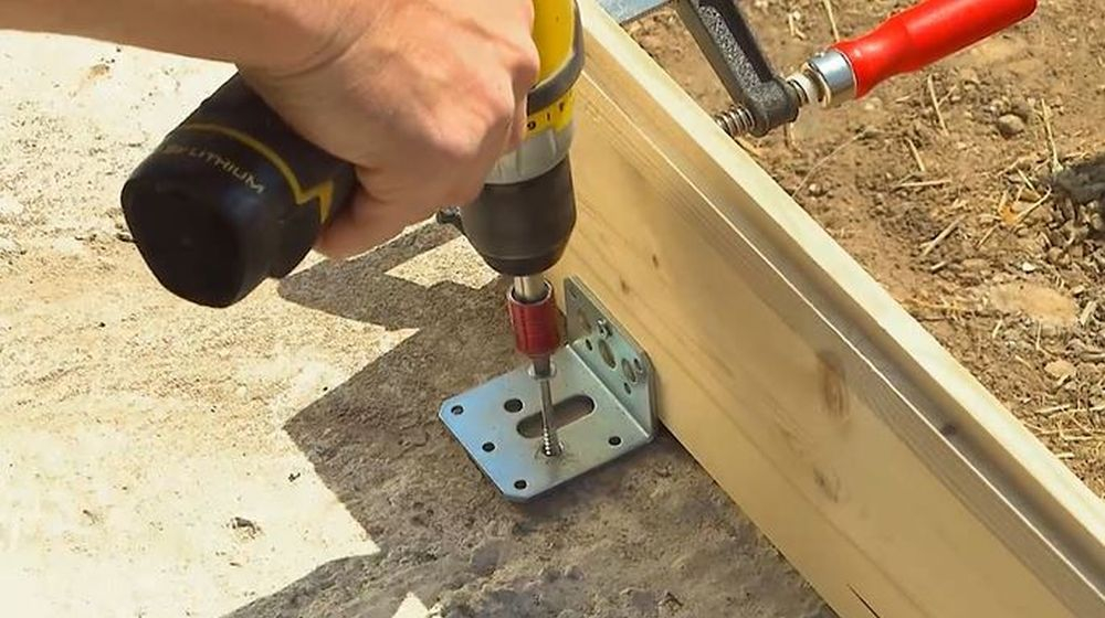 verankering abri de jardin bois