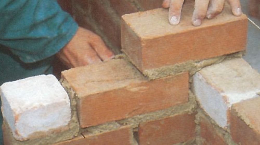 ontmoeting muur metselen