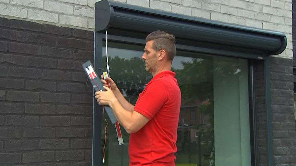 batterij en zonnepaneel volet extérieur